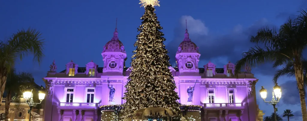 Festive Christmas decorations and giant snow globes at the Place du Casino in Monte-Carlo